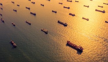 ships at golden sunset at sea