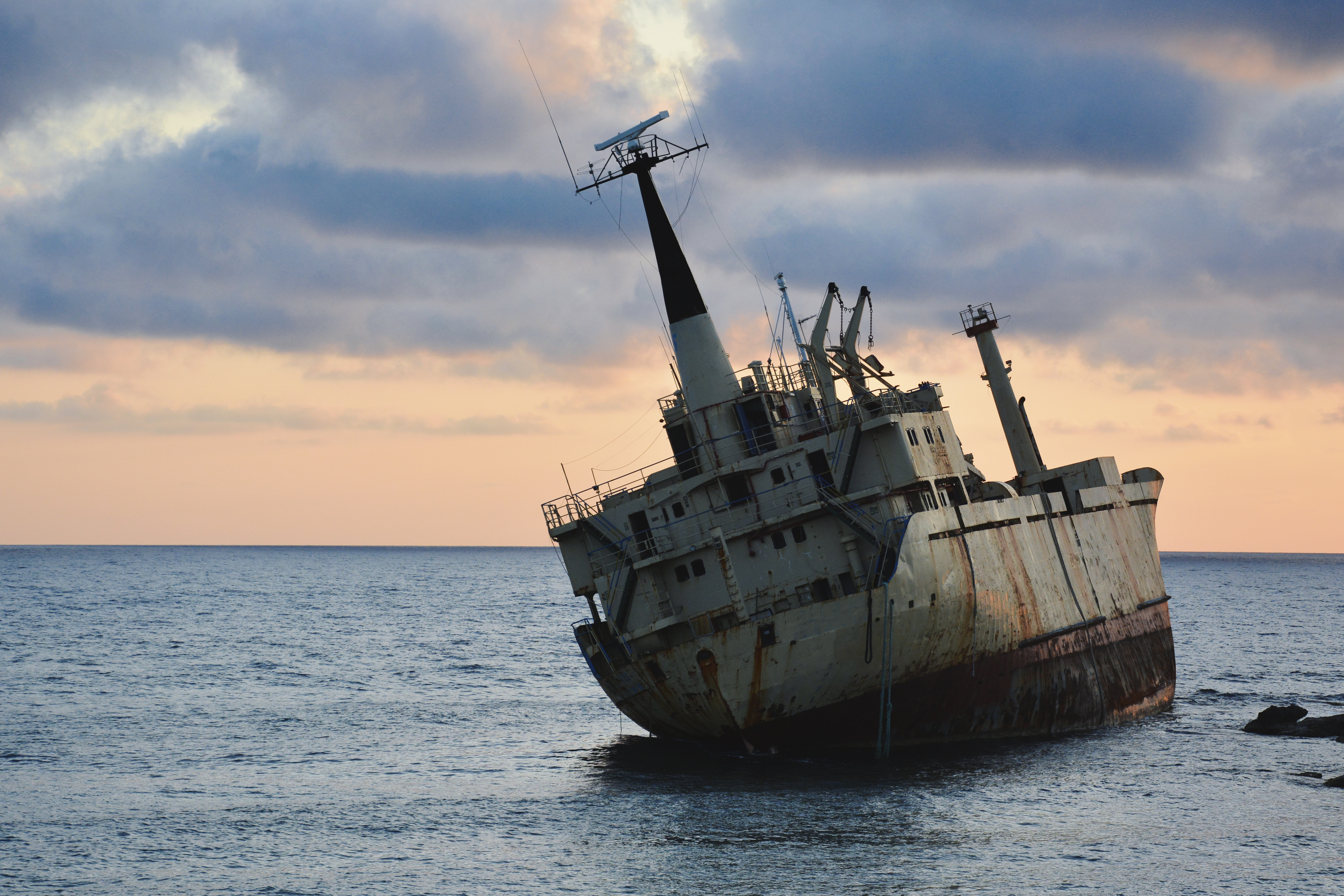 rusty ship on sea