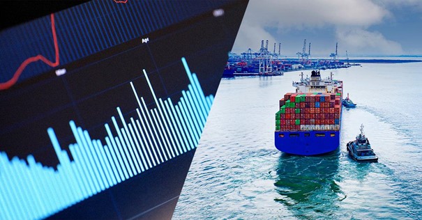 A ship sailing on water with a chart displayed on the screen.