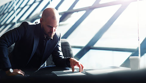 businessman rooftop meeting