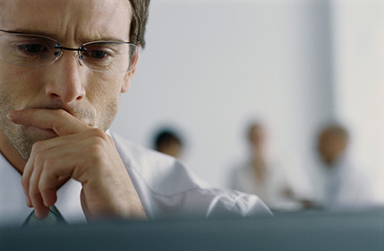 man looking at screen
