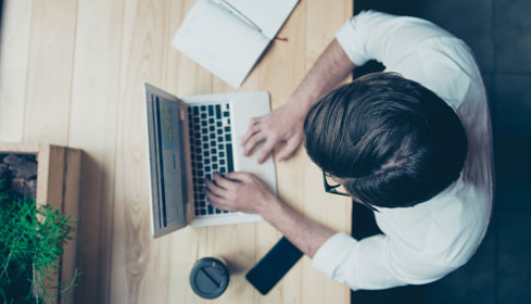 man working on laptop